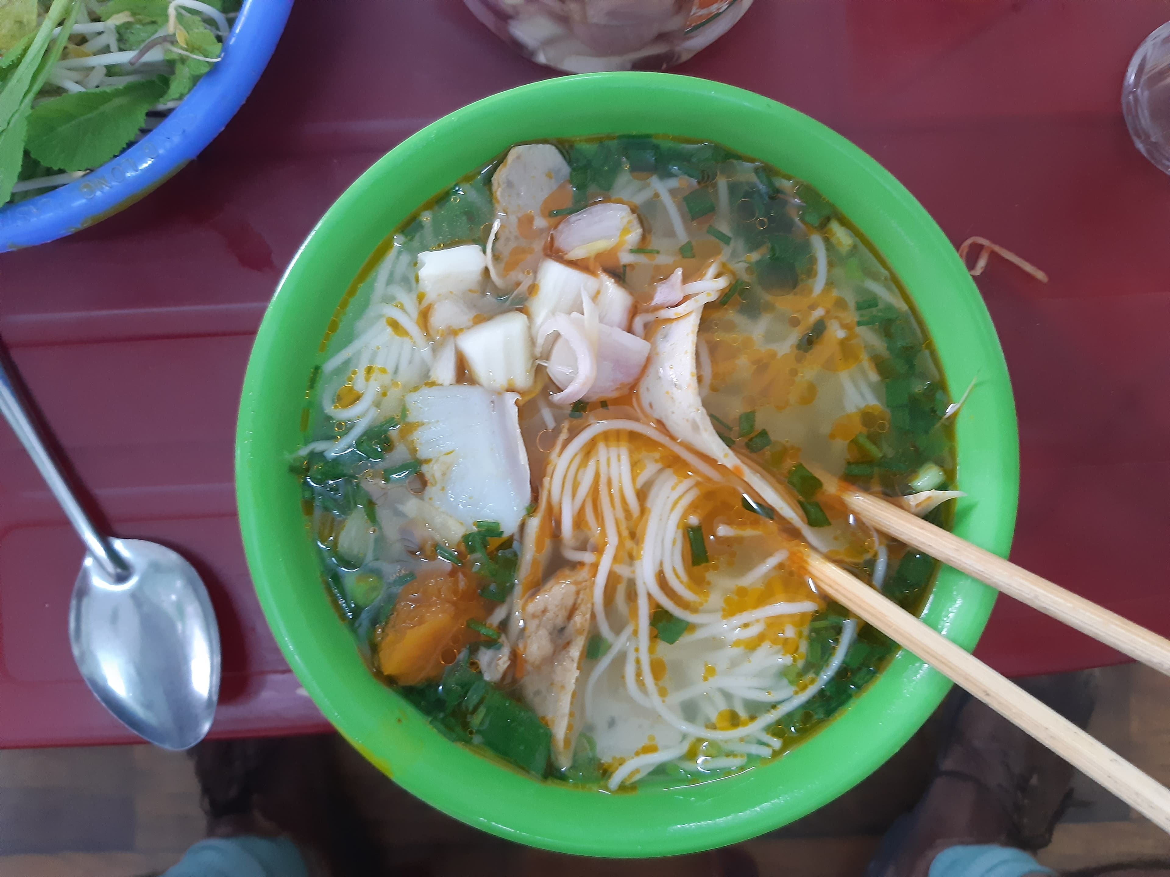 A bowl of Bun Cha Ca fish cake noodle soup.
